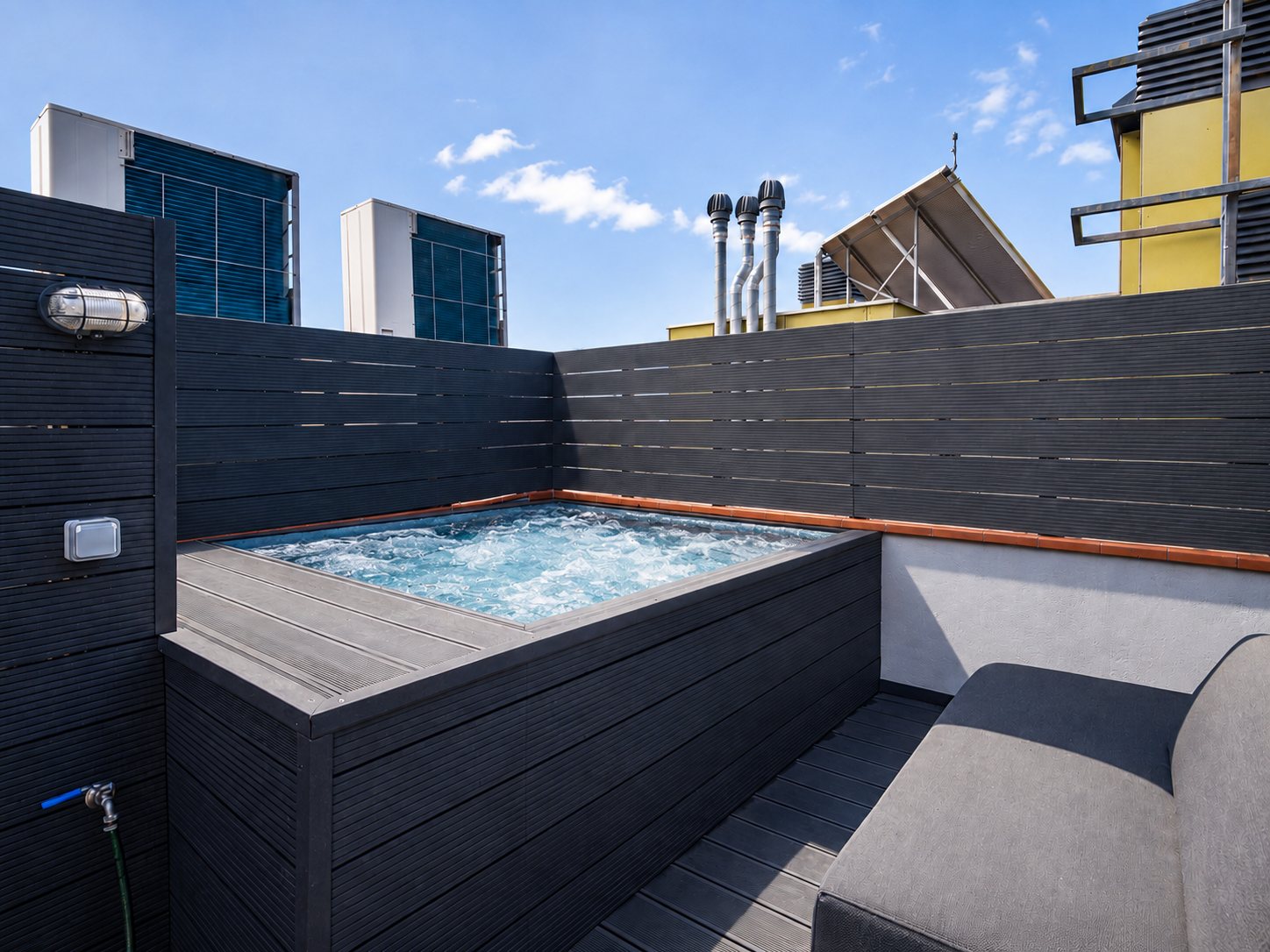 The jacuzzi on the rooftop deck, shown as it will be once the sale completes — a brand-new unit is connected and fitted on completion as part of the sale